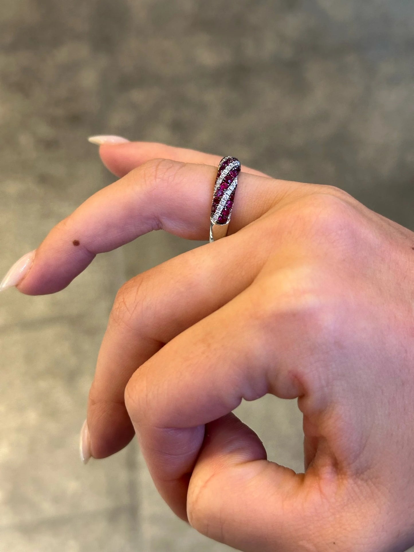 Ladies Swirl Ruby and Round Diamond Ring