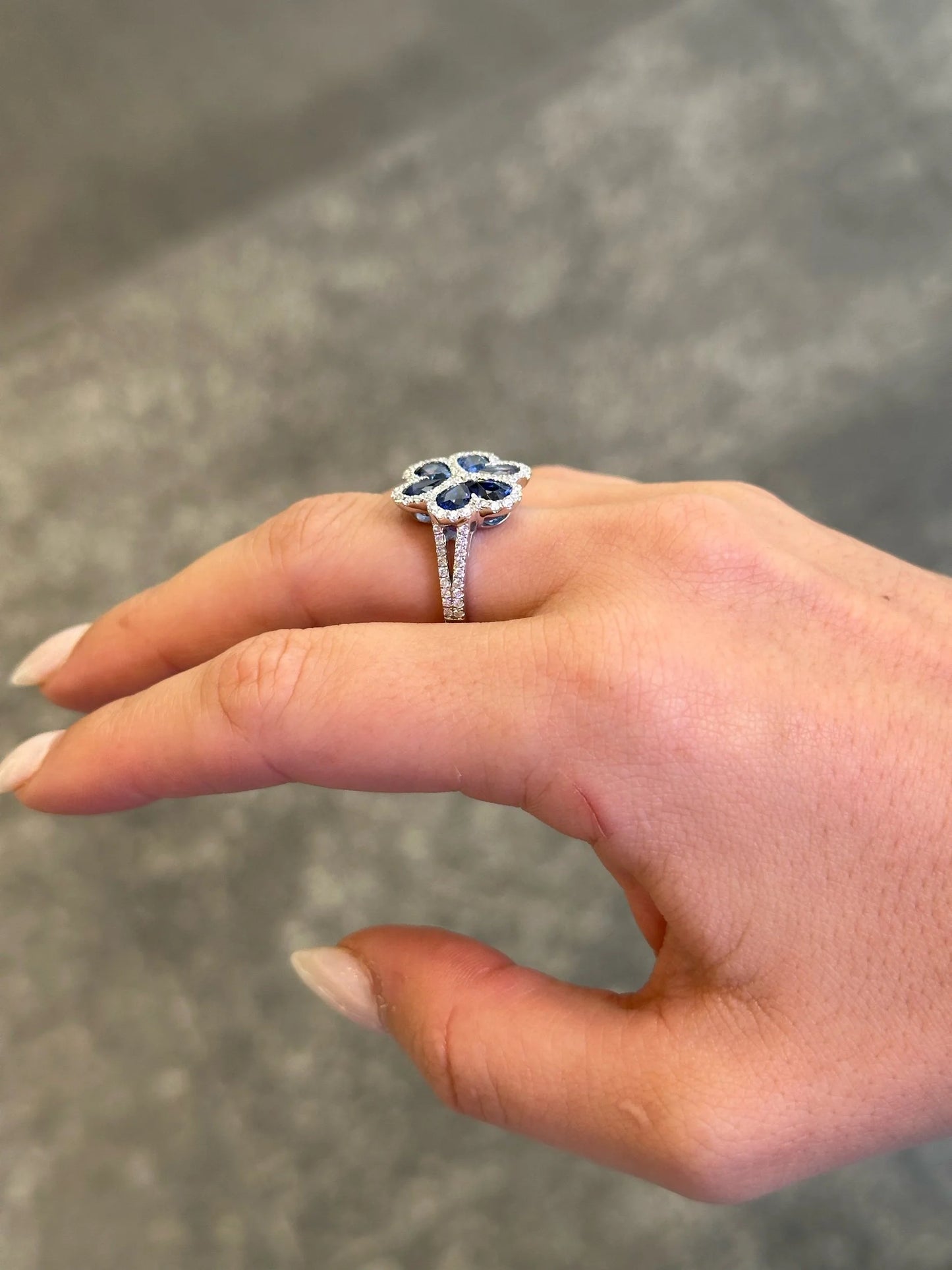 Ladies Flower Shaped Sapphire and Round Diamond Ring