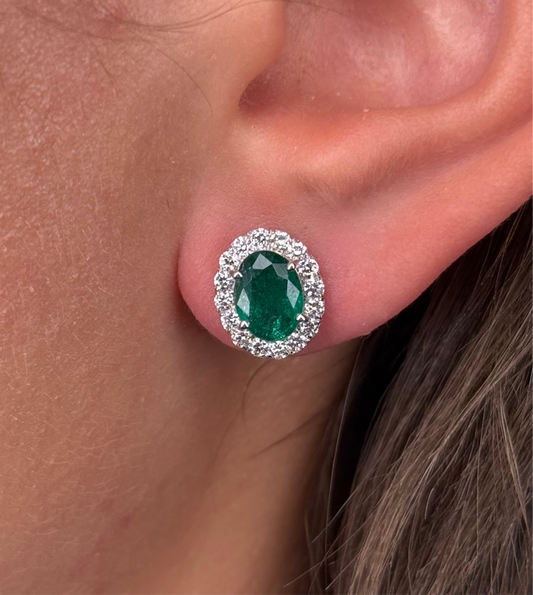 Ladies Oval Emerald and Round Diamond Halo Stud