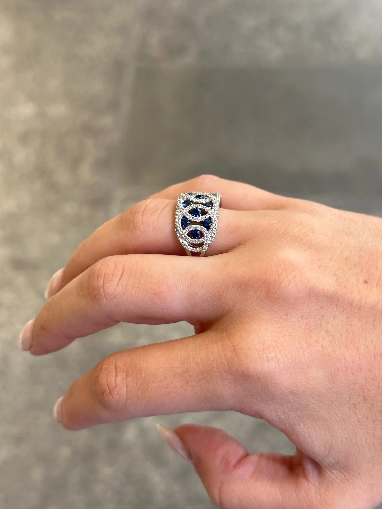 Ladies Intertwined Sapphire and Round Diamond Ring