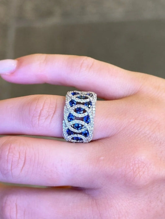 Ladies Intertwined Sapphire and Round Diamond Ring