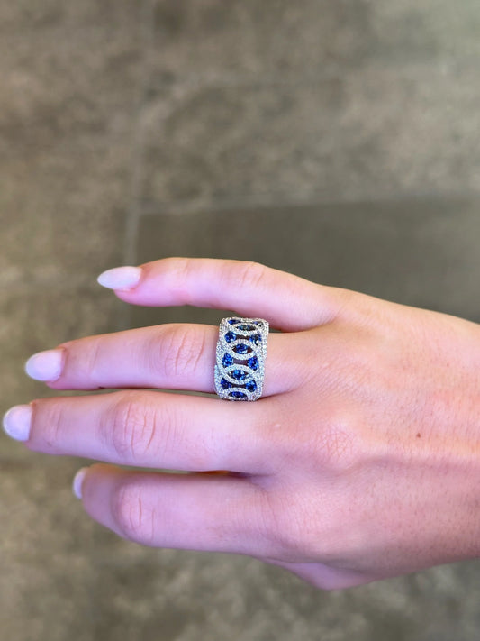 Ladies Intertwined Sapphire and Round Diamond Ring