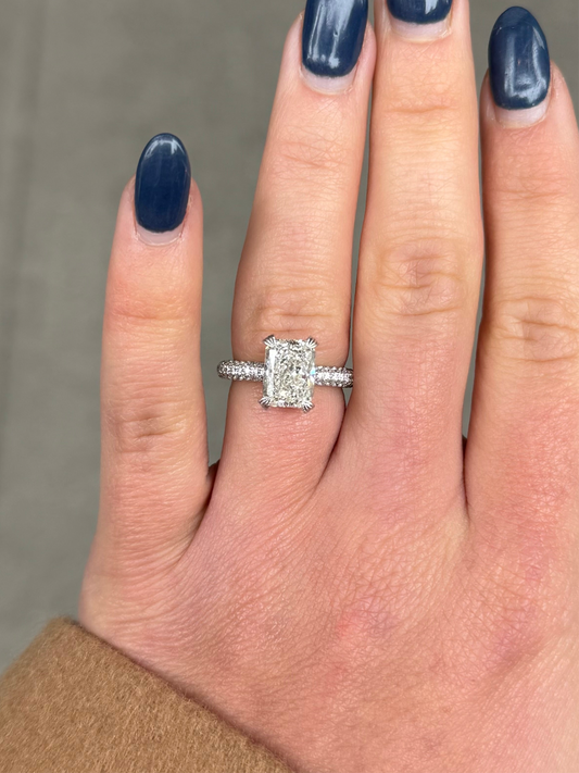 Ladies Radiant Engagement Ring with Under Halo