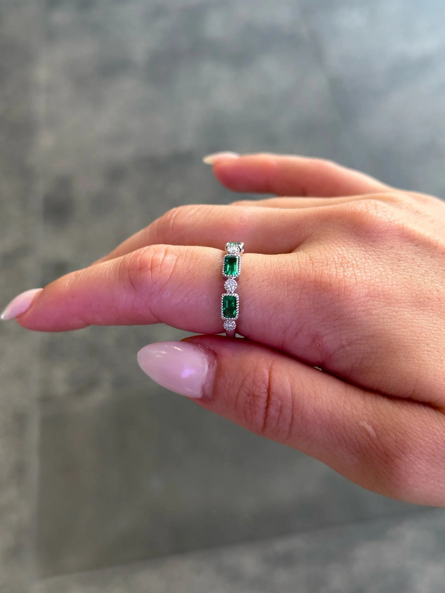 Ladies Three Emerald Stone Round Diamond Ring