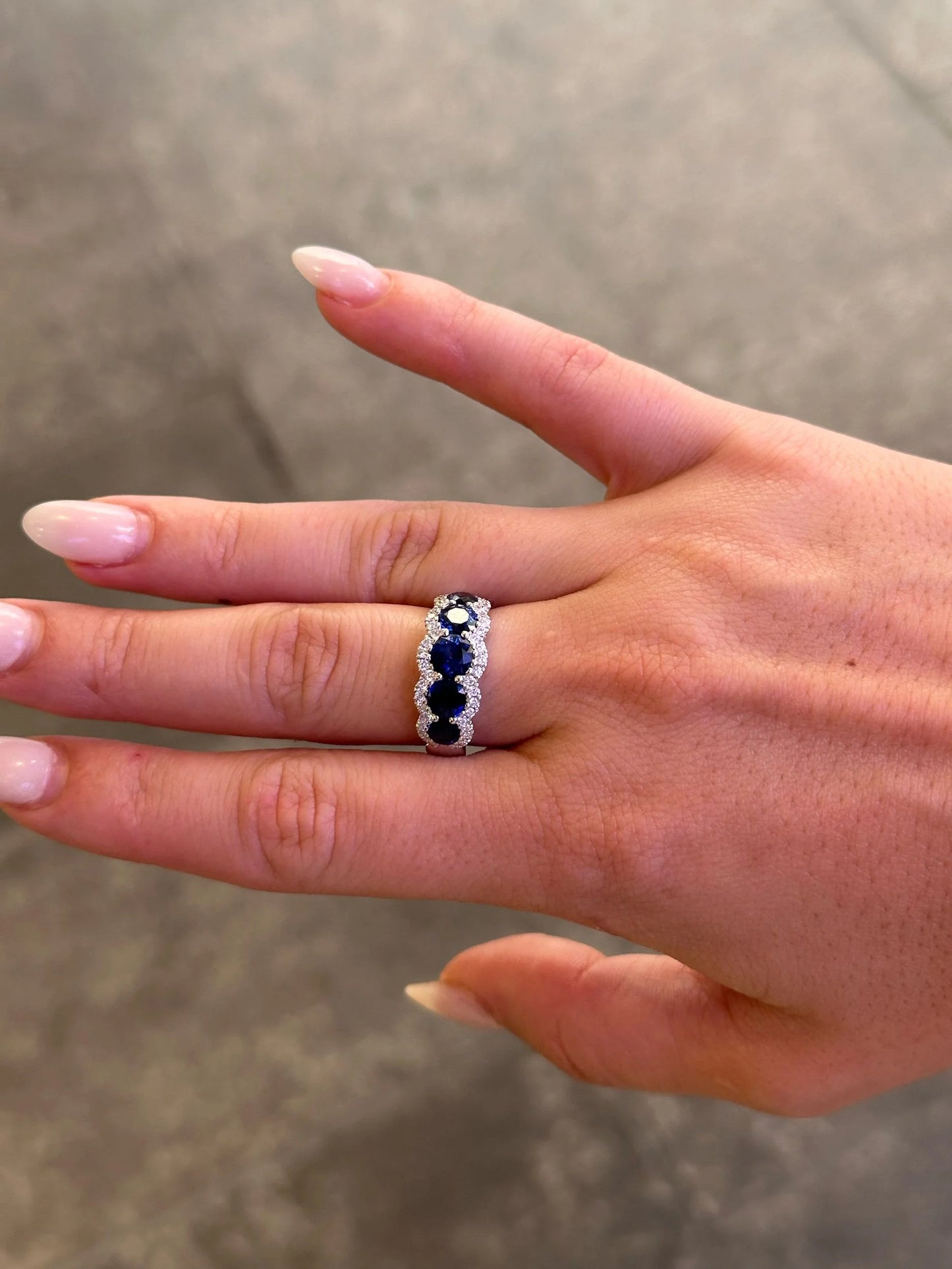 Ladies Five Stone Sapphire with Round Diamond Semi Halo Ring