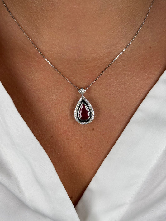 Ladies Pear Shaped Ruby and Round Diamond Pendant