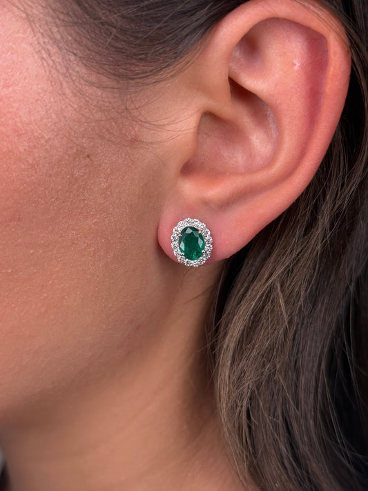 Ladies Oval Emerald and Round Diamond Halo Stud