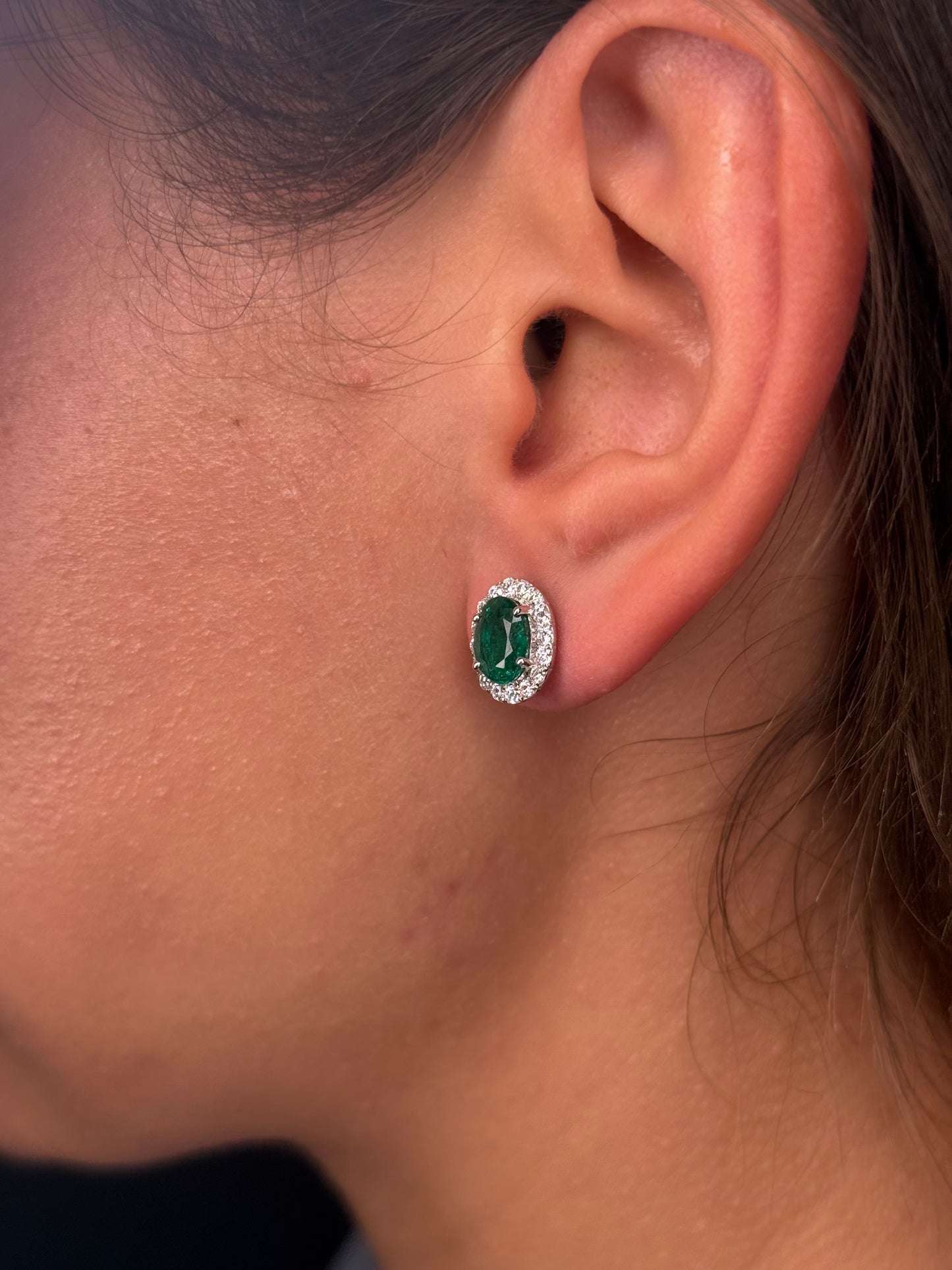 Ladies Oval Emerald and Round Diamond Halo Stud
