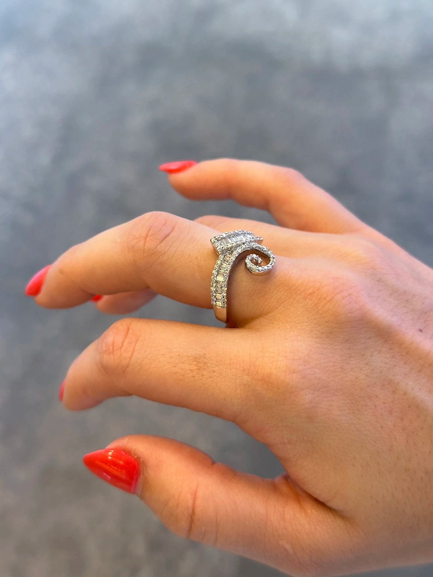 Ladies Baguette and Twisting Round Diamond Ring