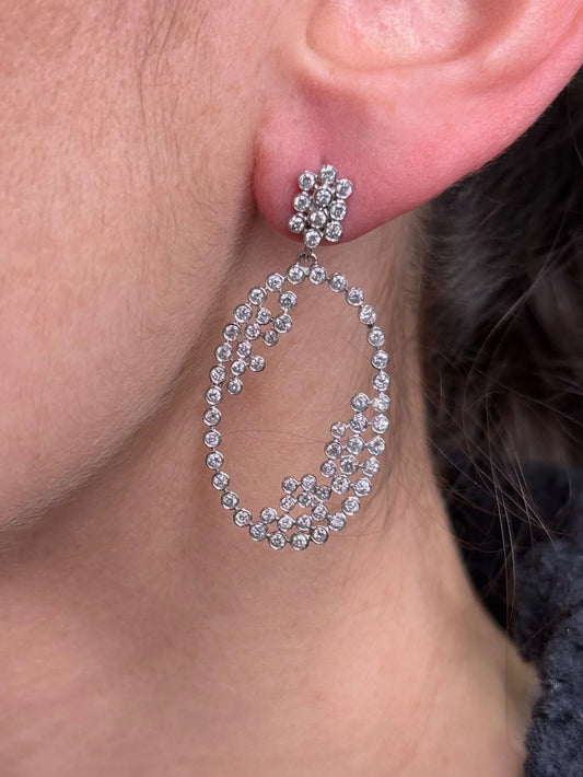 Ladies Oval Bezel Set Round Diamond Earring