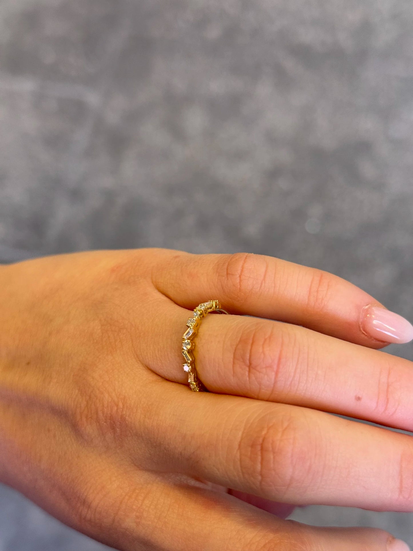 Ladies Yellow Gold Round and Baguette Diamond Wedding Band