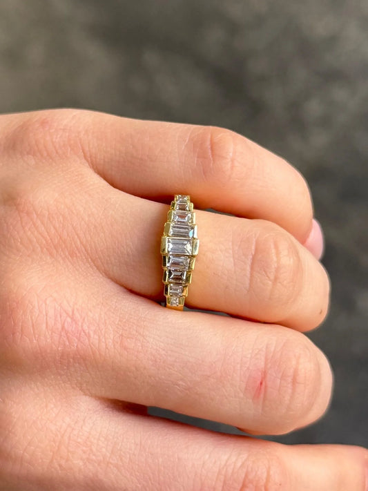 Ladies Half Bezel Emerald Graduated Diamond Band