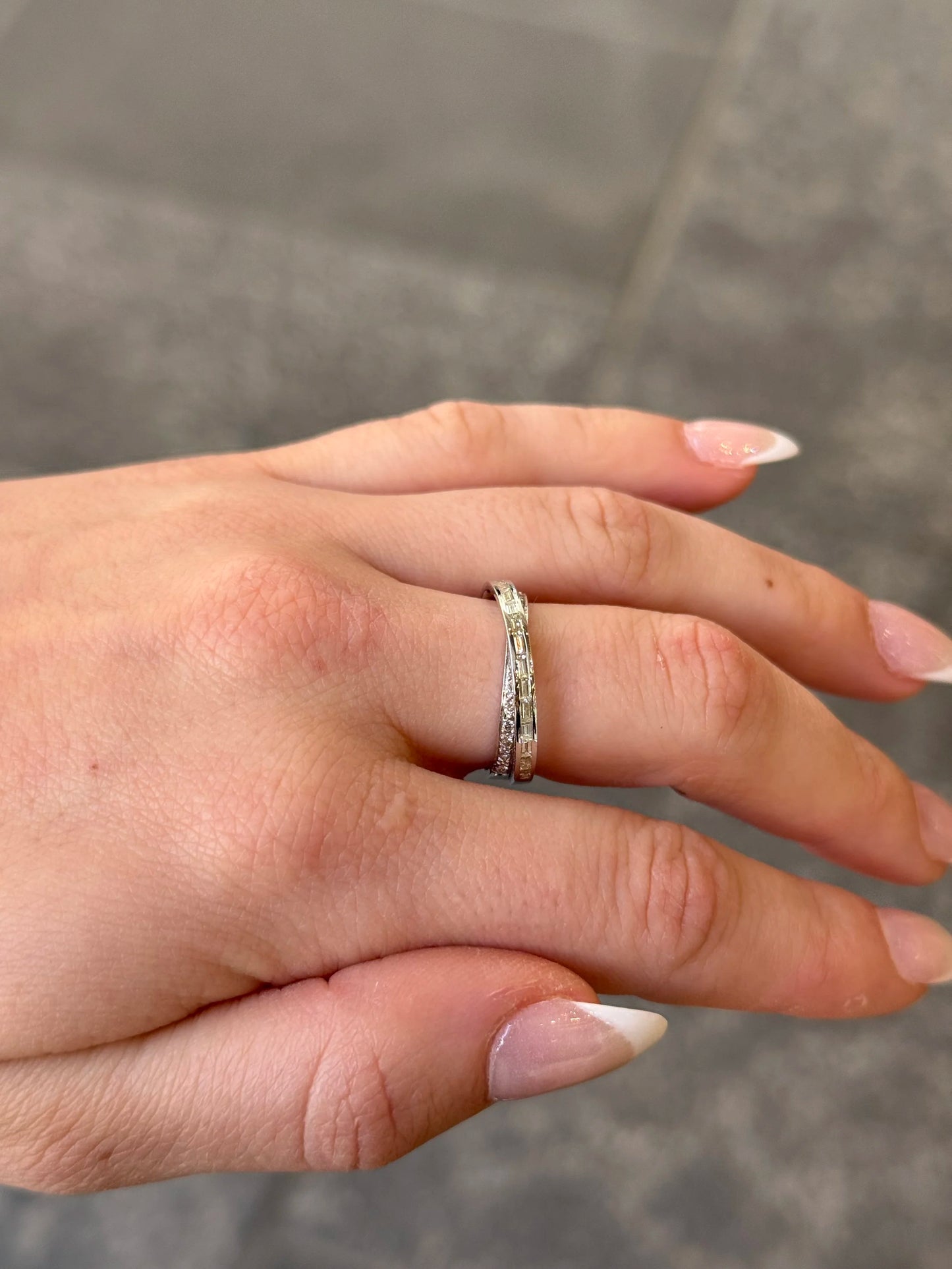 Ladies Overlapping Round and Baguette Diamond Ring