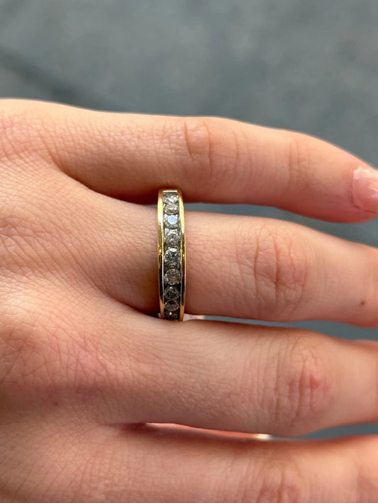 Ladies Yellow Gold and Diamond Channel Set Wedding Band