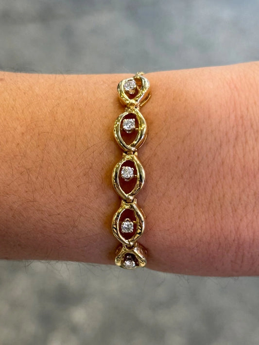 Ladies Adjustable Five Spaced Out Gold and Center Diamond Bracelet