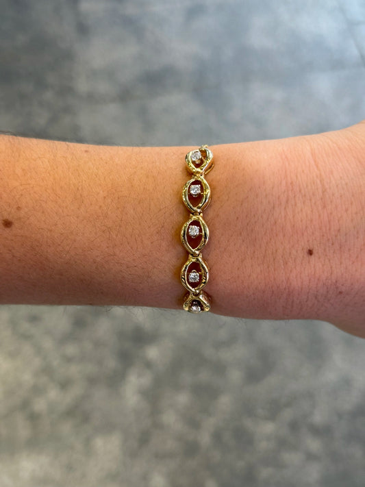 Ladies Adjustable Five Spaced Out Gold and Center Diamond Bracelet