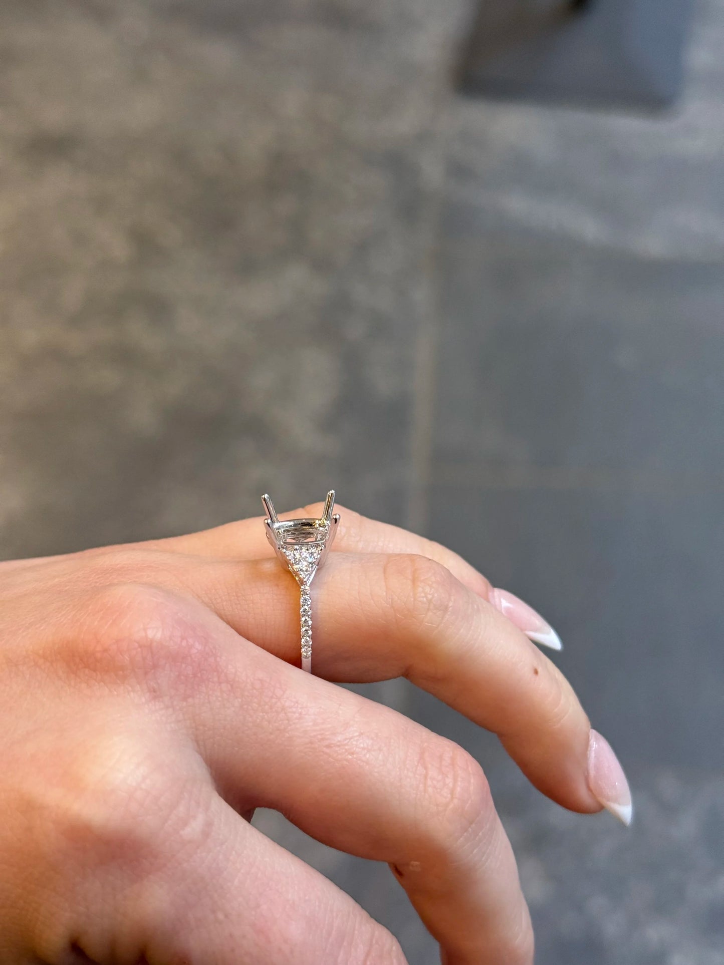 Ladies White Gold and Trilliant Diamond Custer Side Engagement Ring