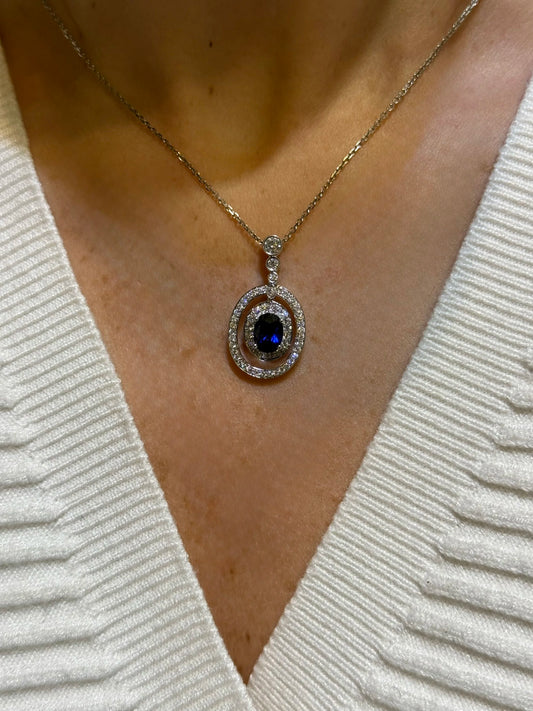 Ladies Halo Oval Sapphire Pendant