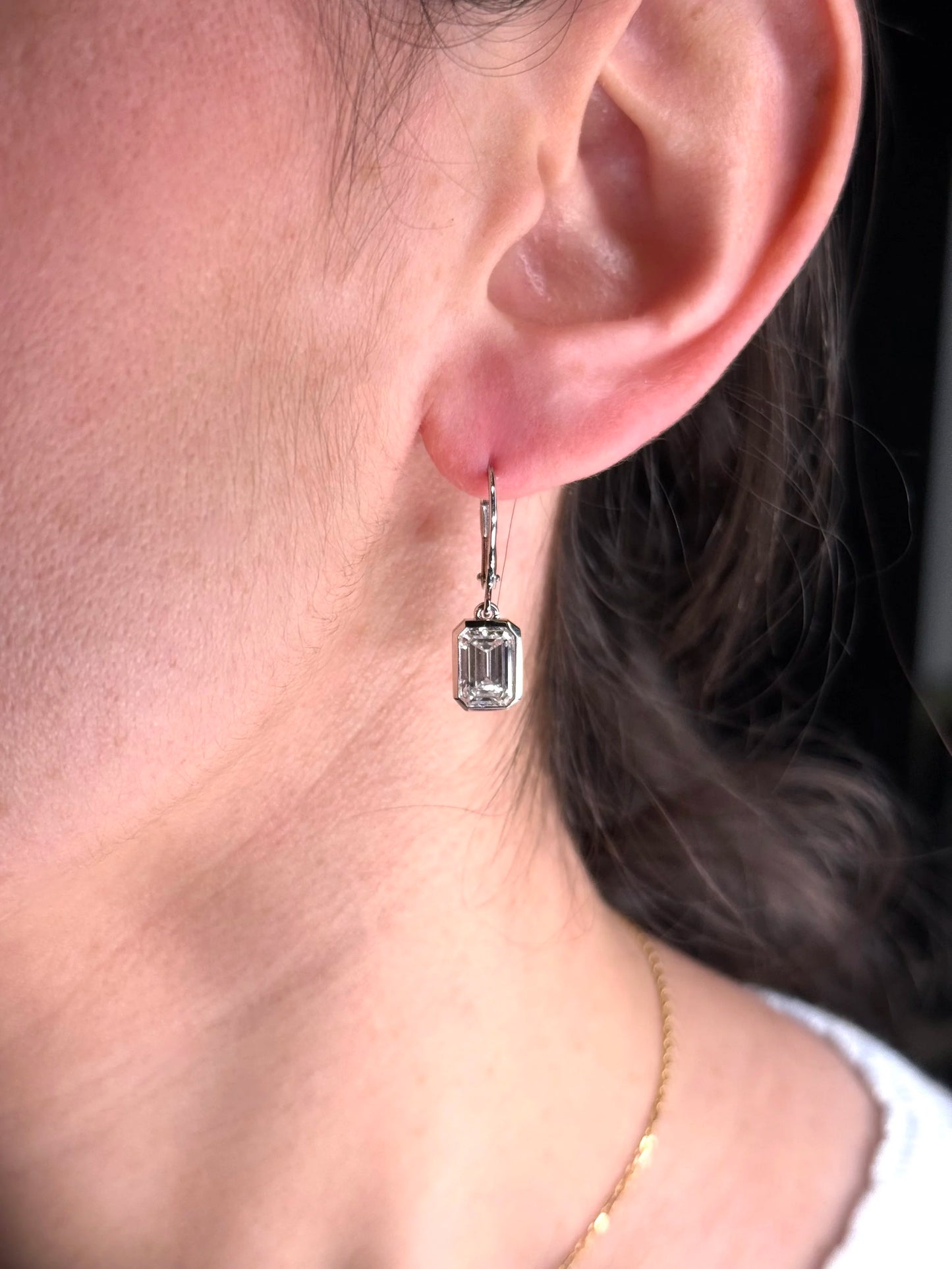 Ladies Dangling Bezel Set Emerald Lab Grown Earring