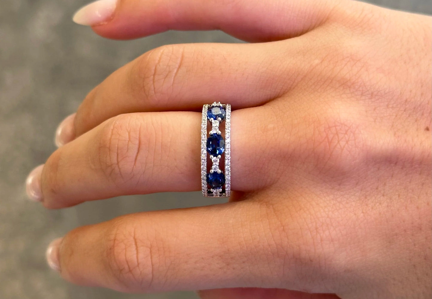 Ladies Three Stone Sapphire and Round Diamonds Band