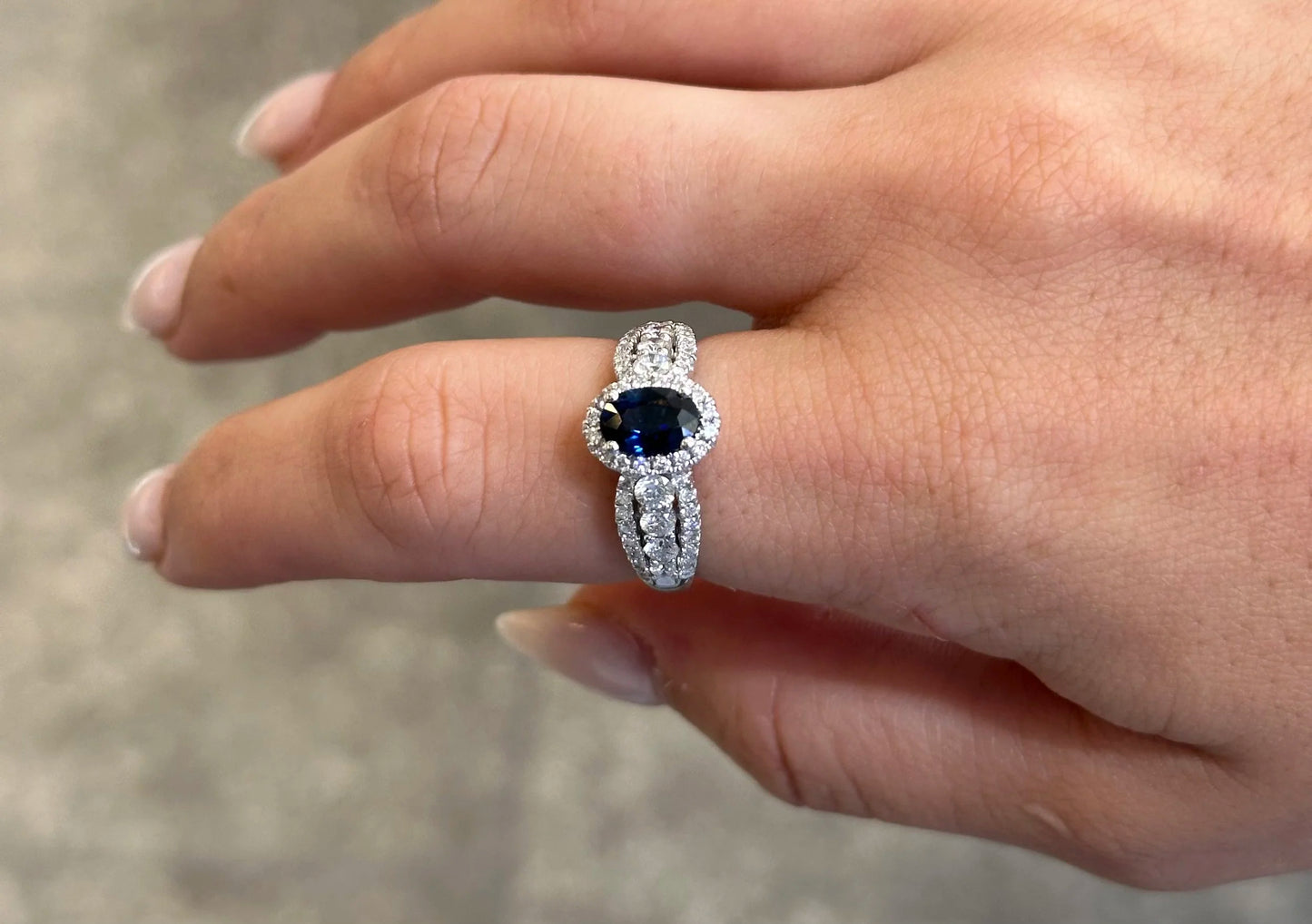 Ladies Sapphire Stone and Round Diamond Ring with Halo and Triple Shank