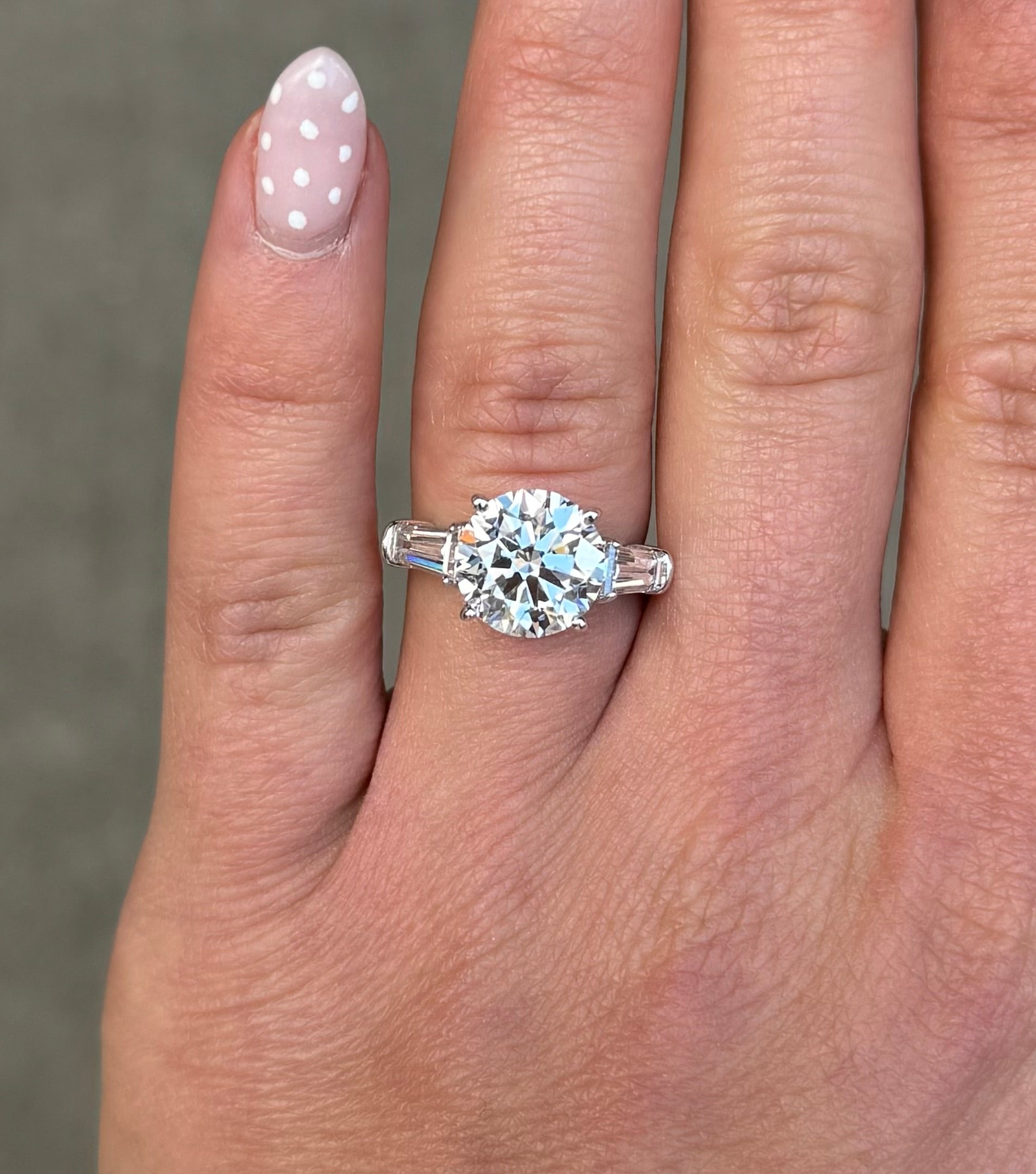 Ladies Round Diamond and Baguette Side Stone Engagement Ring