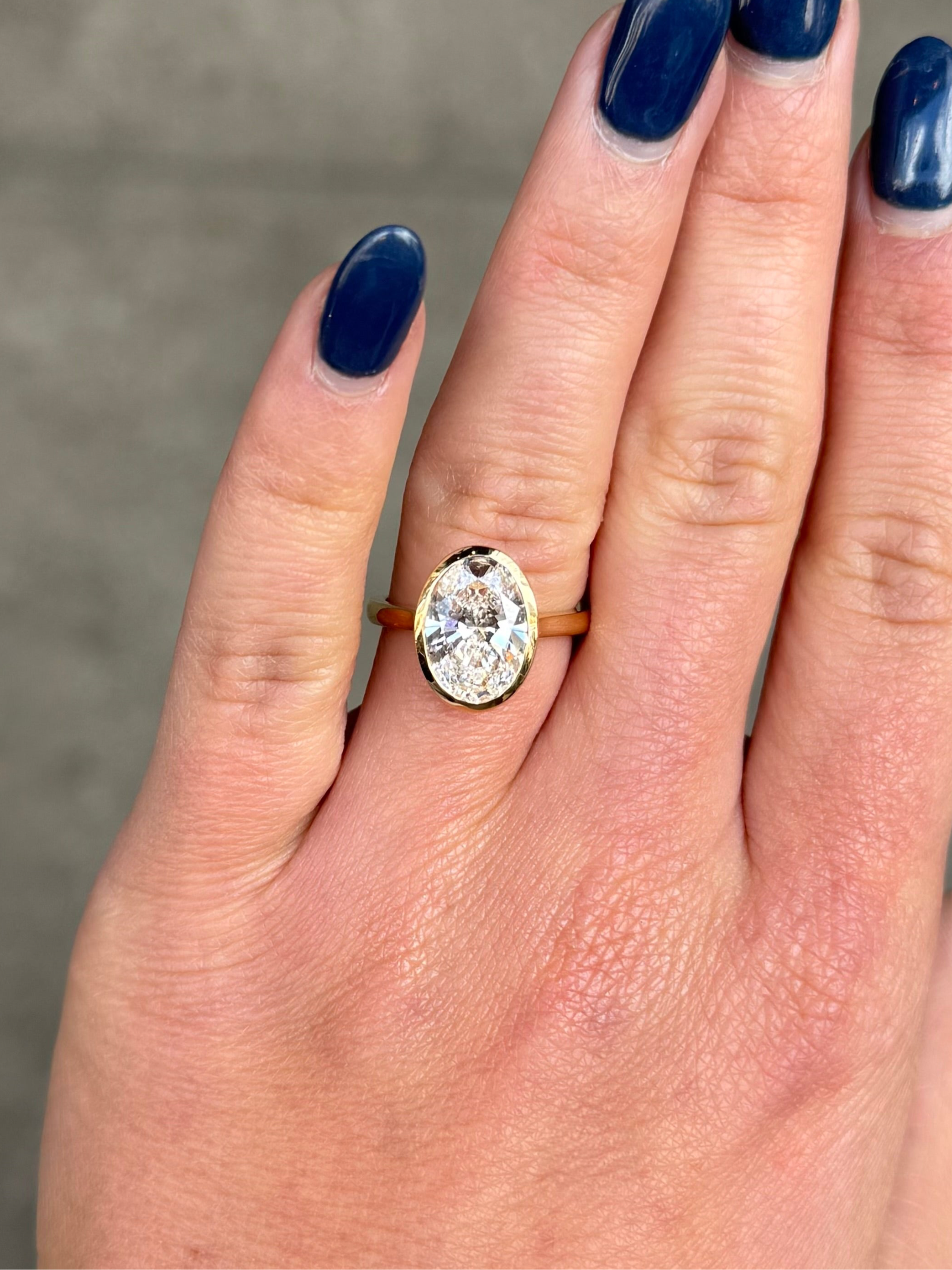 Ladies Lab Grown Oval Bezel Set Engagement Ring