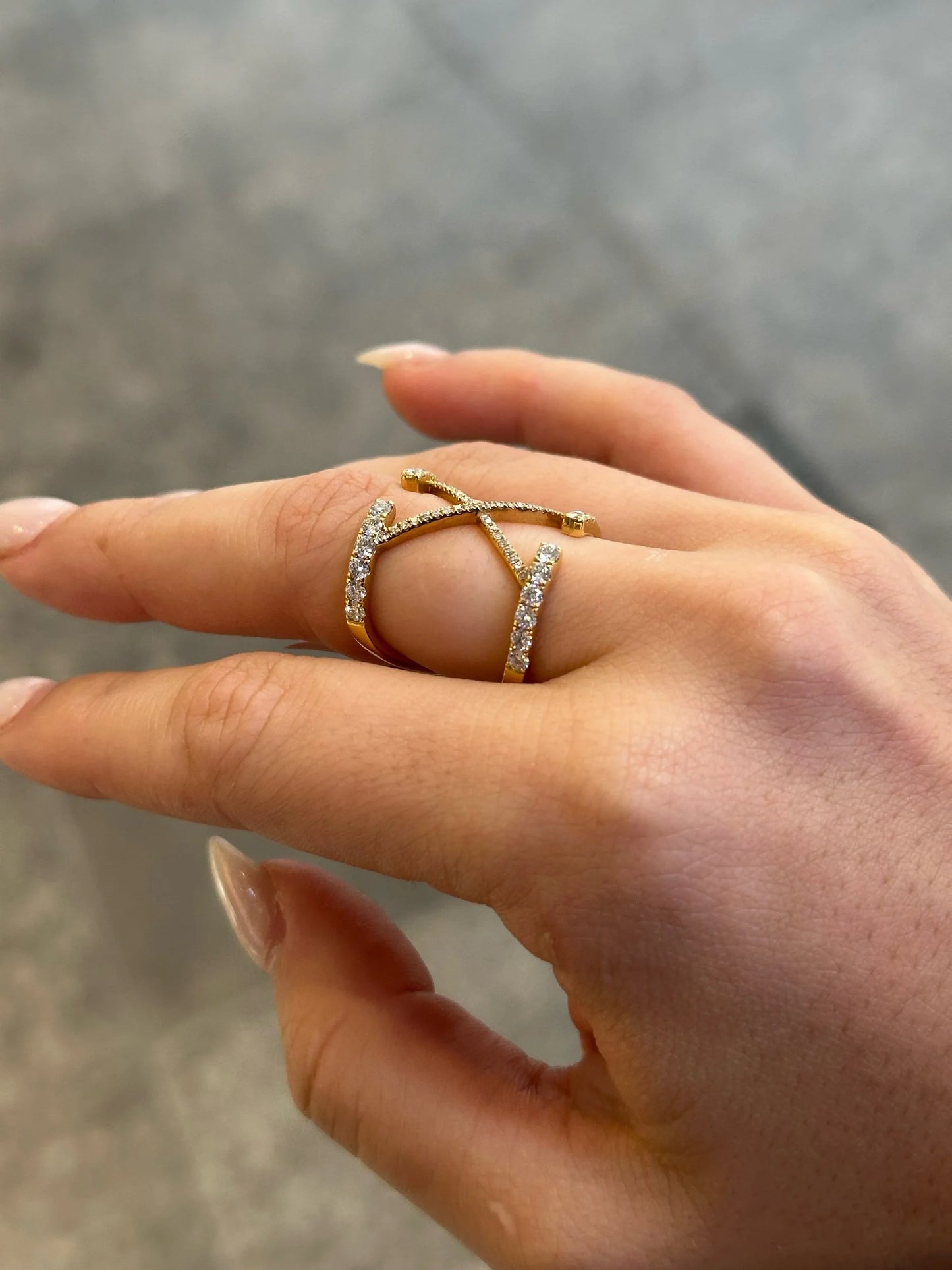 Ladies “X” Round Diamond Ring