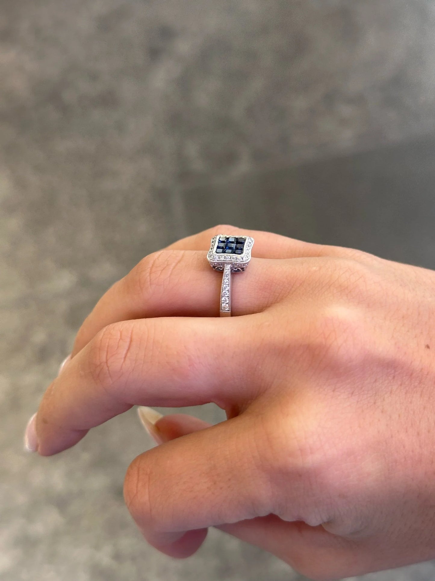 Ladies Princess cut Sapphire and Halo Round Diamond Milgrain Ring