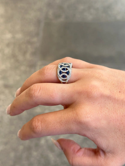 Ladies Intertwined Sapphire and Round Diamond Ring