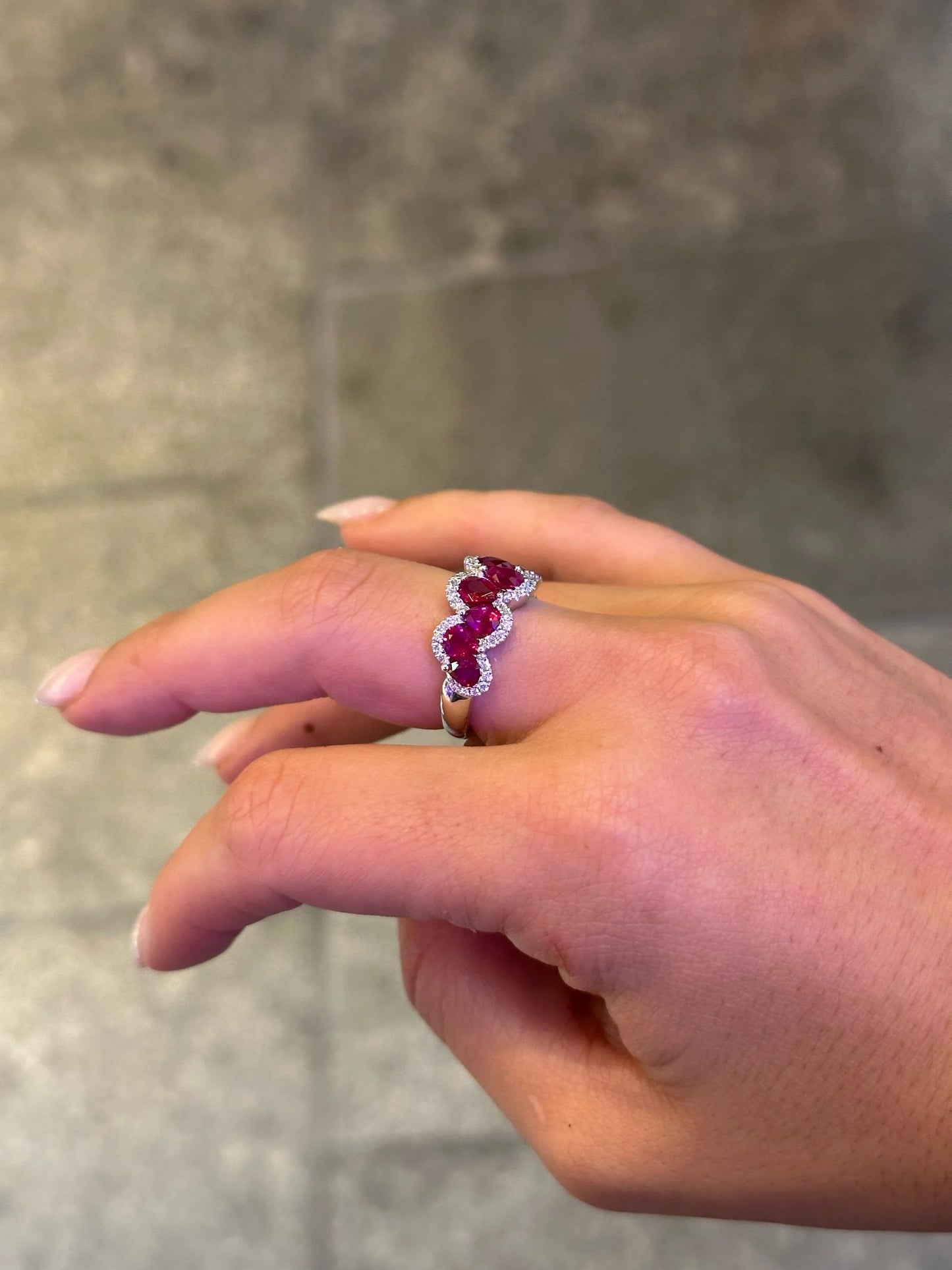 Ladies Pear Shaped Ruby and Round Diamond Ring