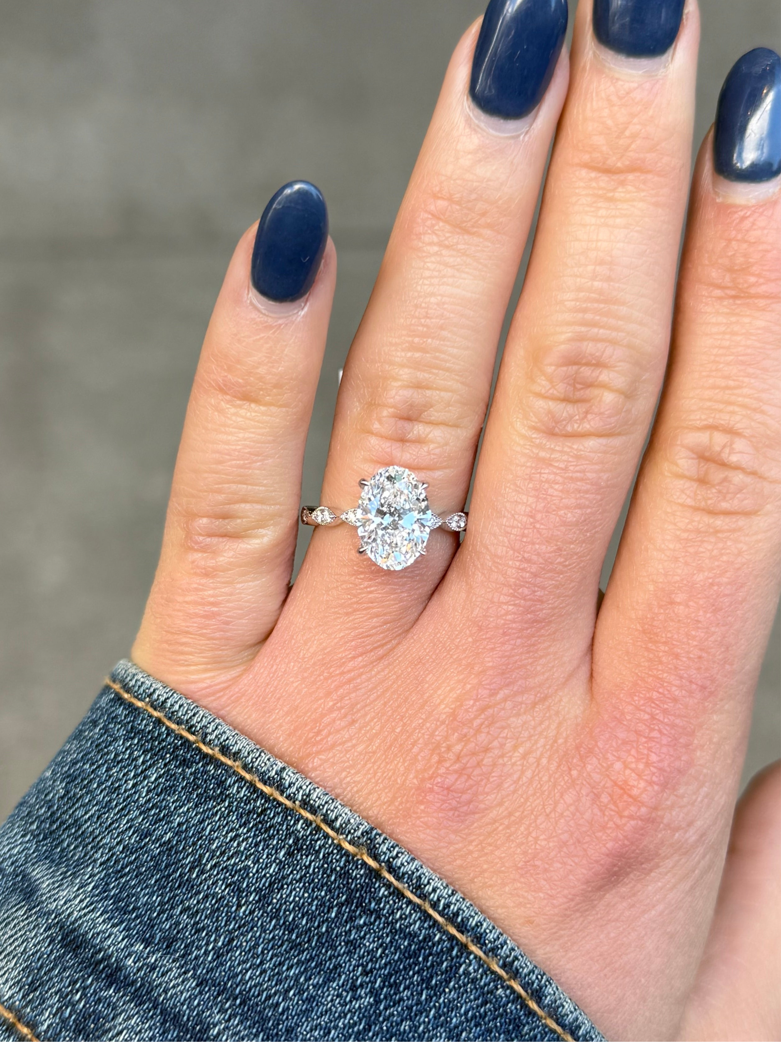 Ladies Lab Grown Oval Center Marquise Shank and Under Halo Engagement Ring