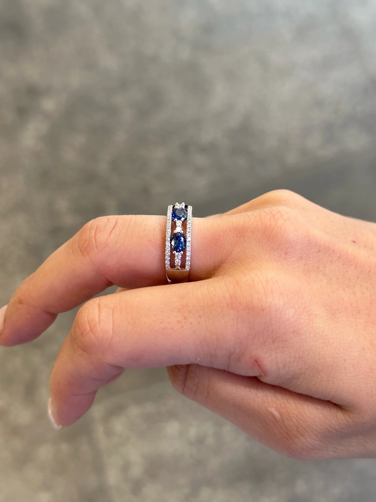Ladies Three Stone Sapphire and Round Diamonds Band