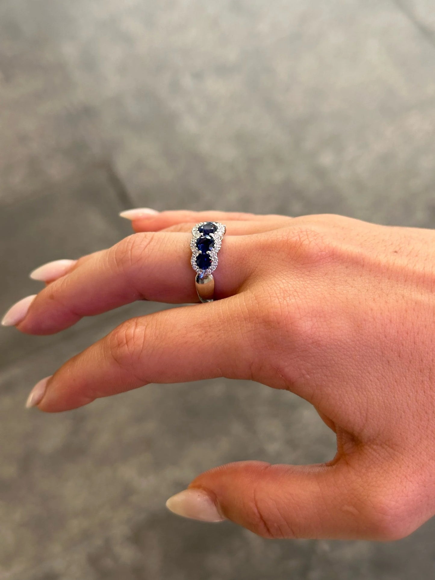 Ladies Five Stone Sapphire with Round Diamond Semi Halo Ring