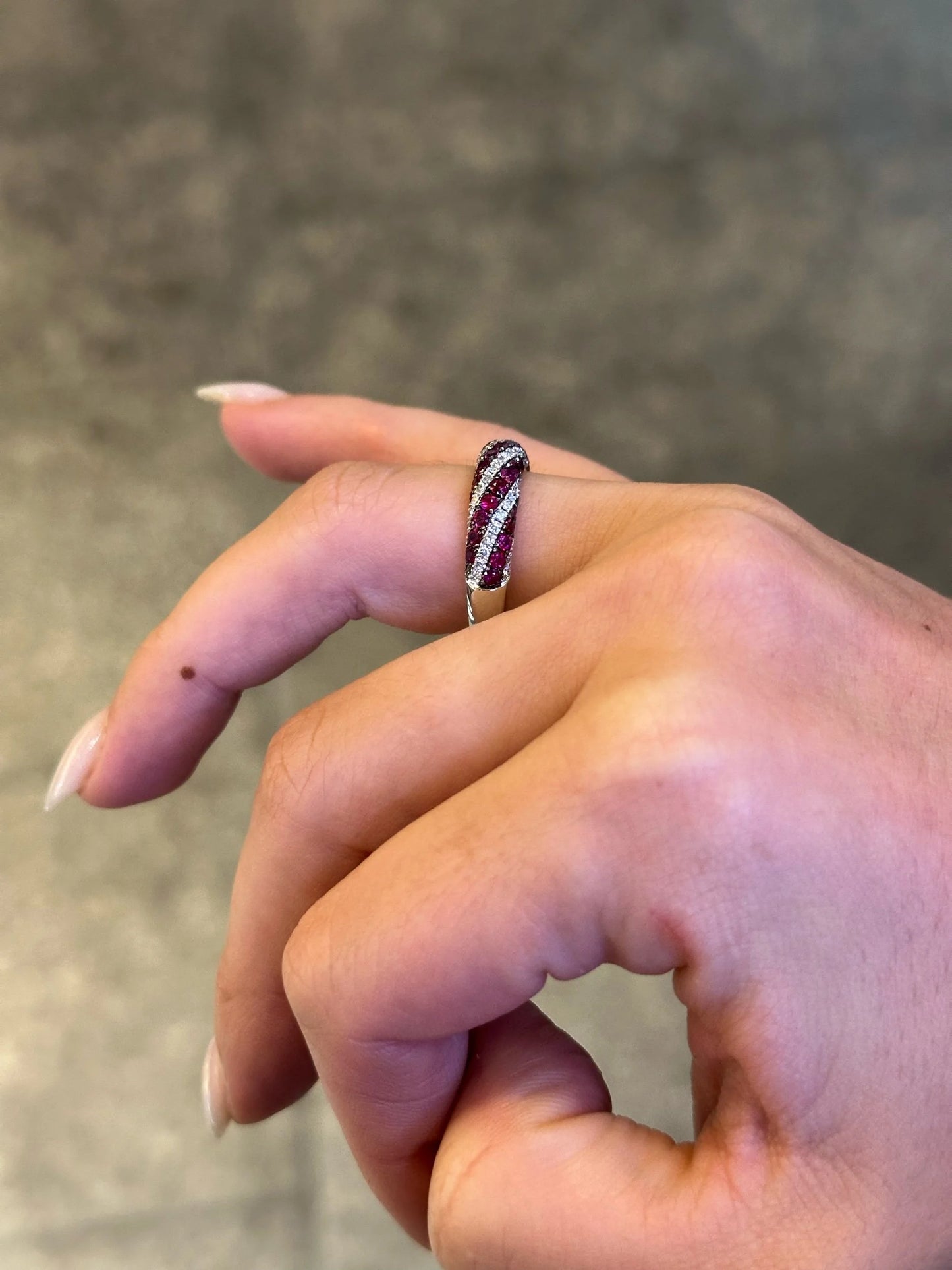 Ladies Swirl Ruby and Round Diamond Ring