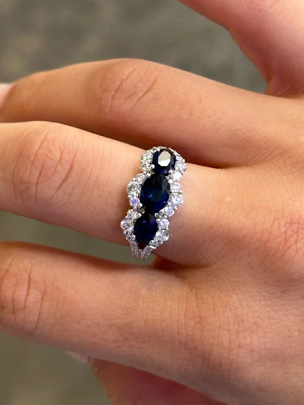 Ladies Three Stone Sapphire and Round Diamond Ring with a Split Shank
