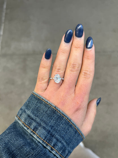 Ladies Lab Grown Oval Center Marquise Shank and Under Halo Engagement Ring