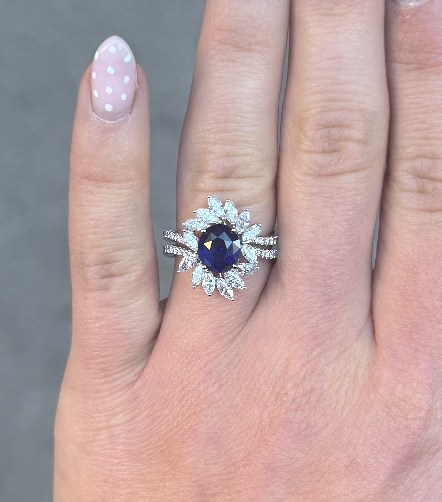 Ladies Oval Sapphire and Marquise Halo Ring
