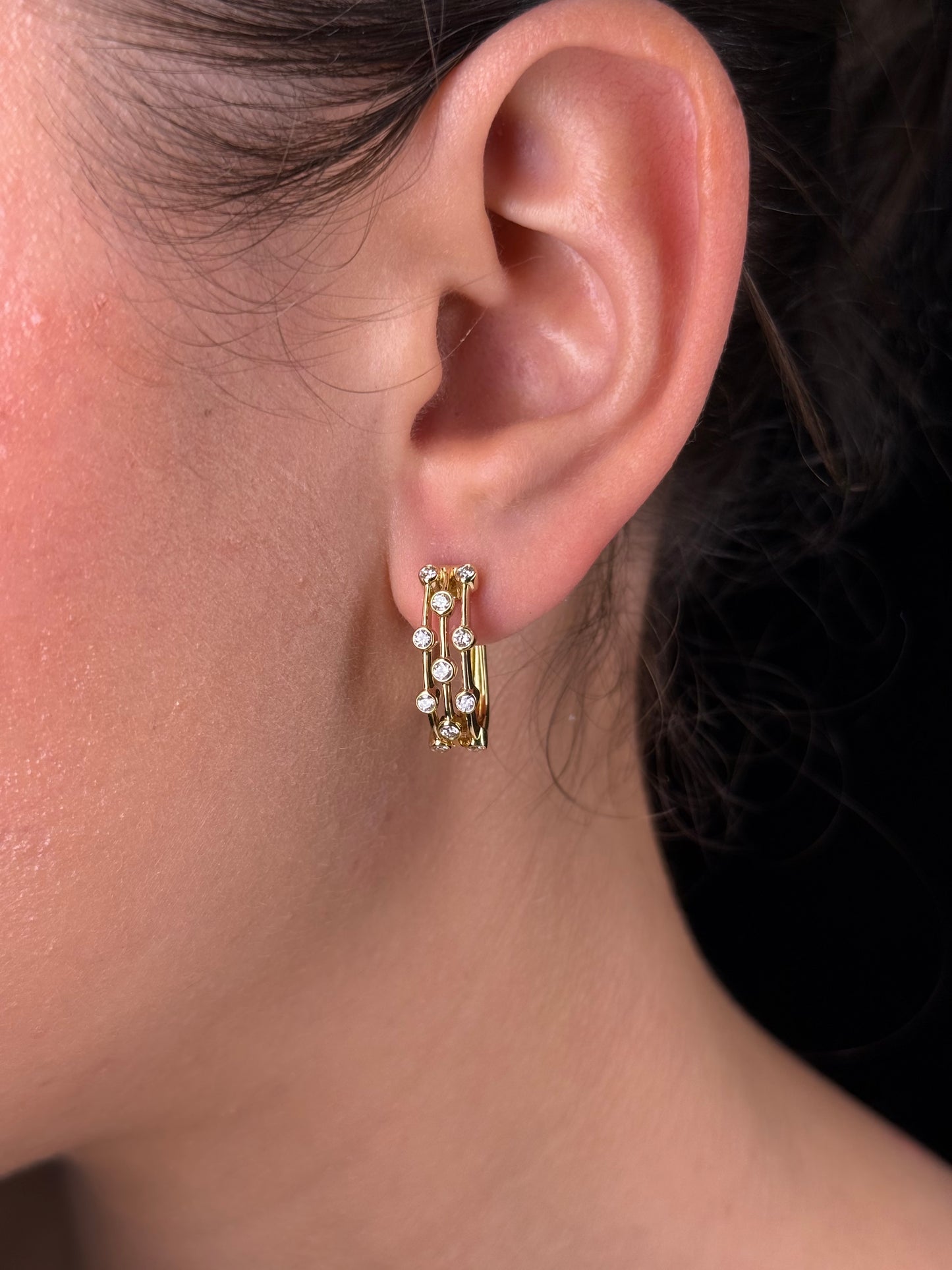 Ladies Multi-Row Round Diamond Bezel Set Huggie