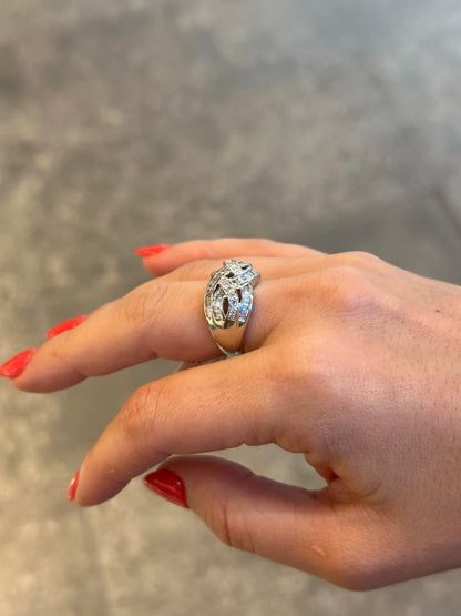 Ladies Intertwining Baguette and Round Diamond Ring
