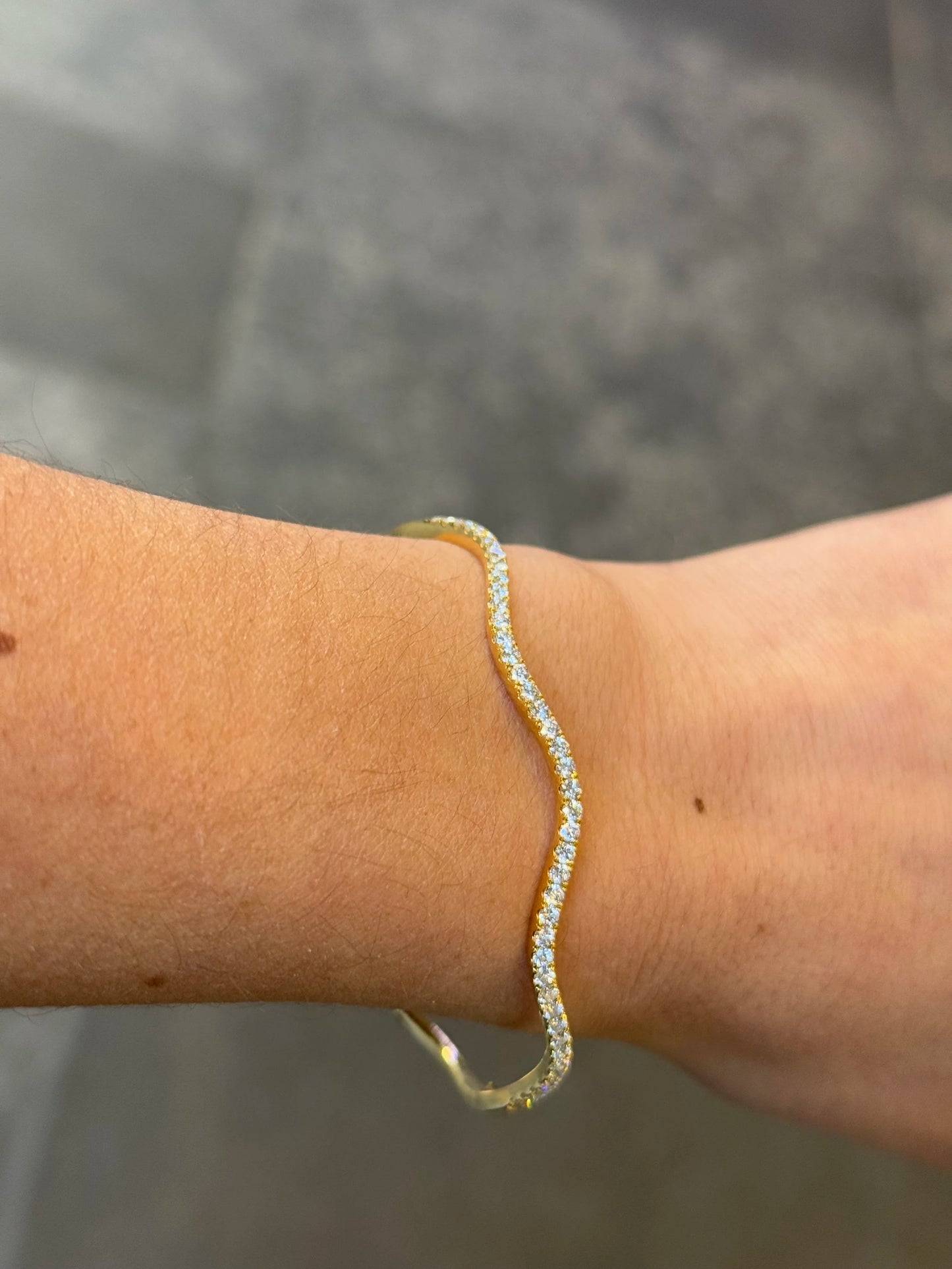 Ladies Twist Design Round Diamond Bangle