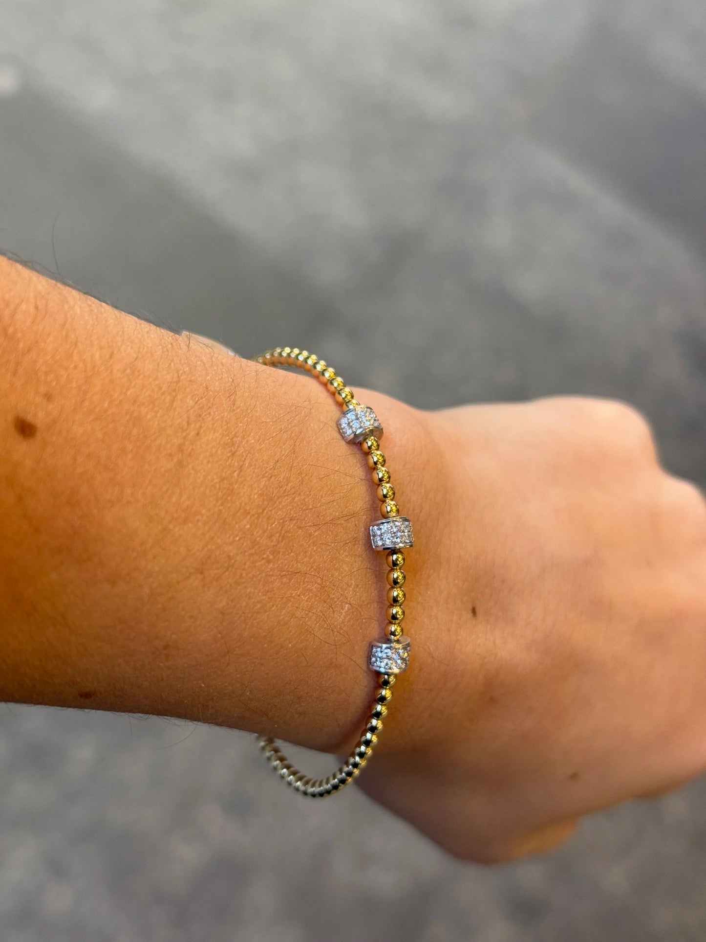 Ladies Three Diamond Piece and Gold Ball Style Bangle