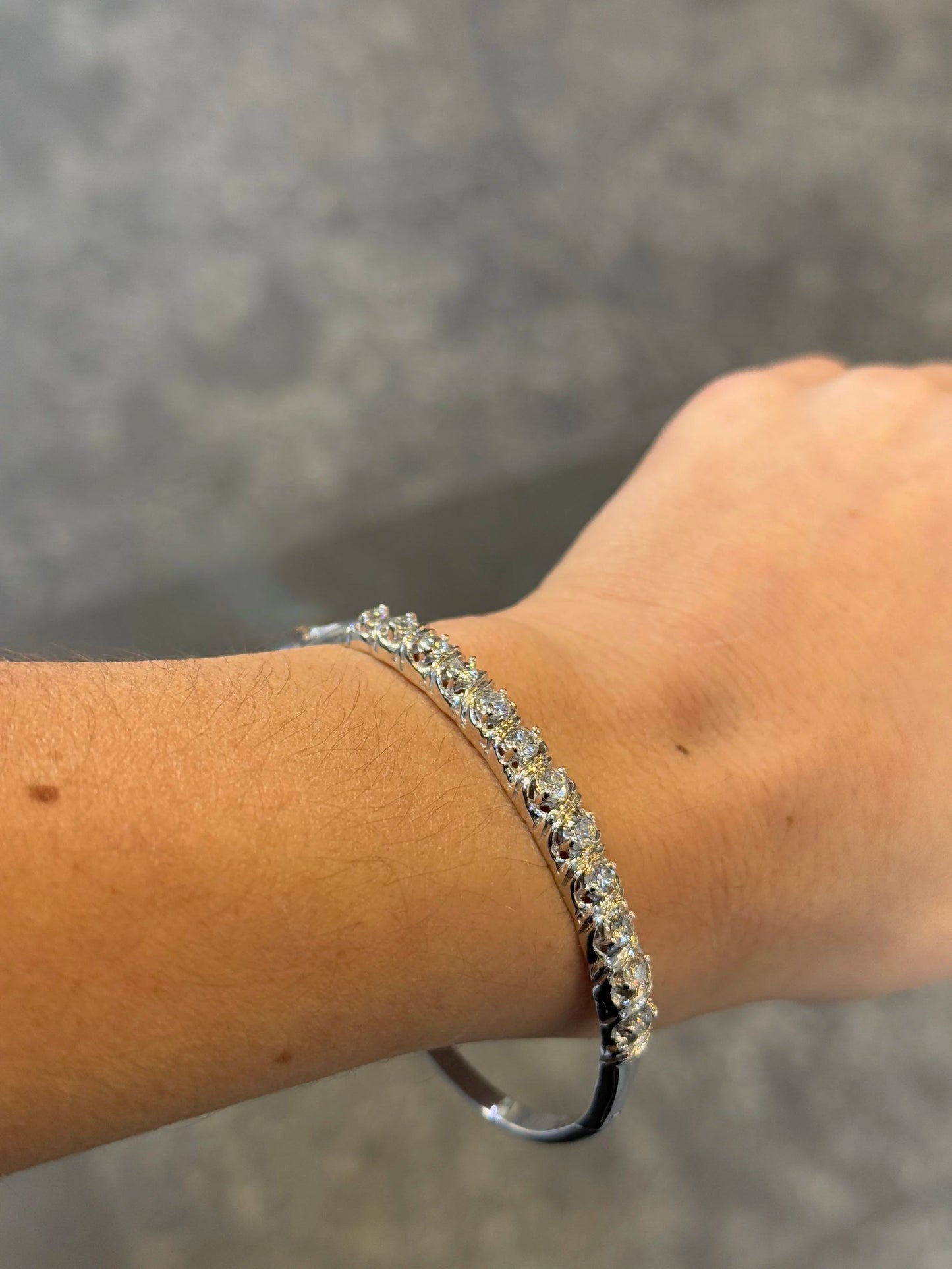 Ladies White Gold Twelve Stone Bangle