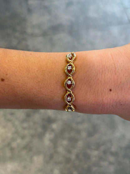 Ladies Adjustable Five Spaced Out Gold and Center Diamond Bracelet
