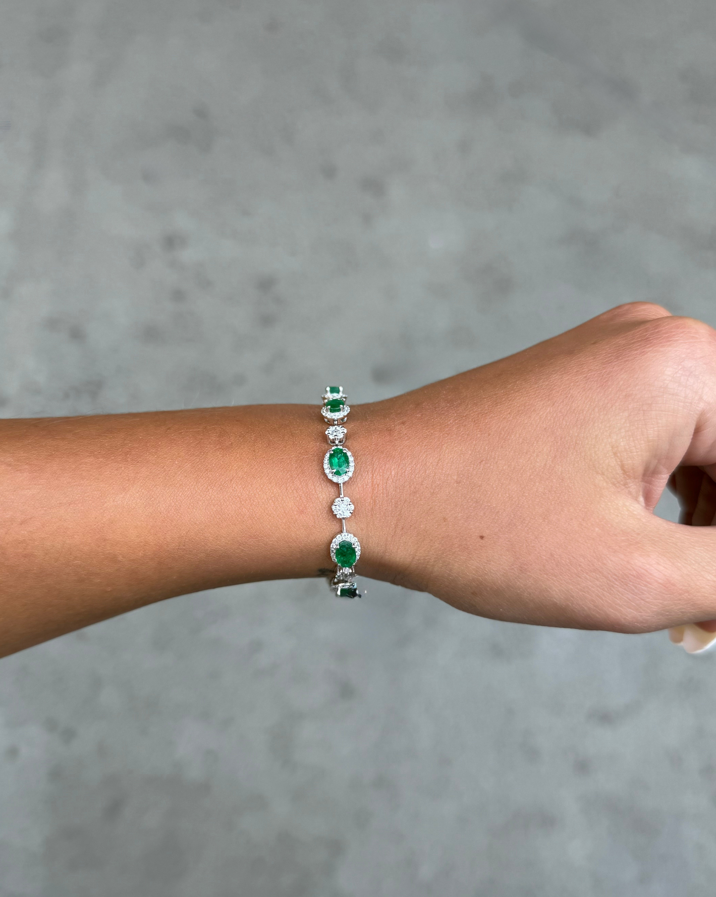 Ladies Emerald and Diamond Halo Bracelet